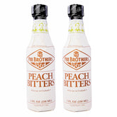 Fee Brothers Peach Cocktail Bitters bottle front, premium flavor for cocktails.