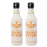 Fee Brothers West Indian Orange Bitters bottle pour highlights citrus aroma for cocktails