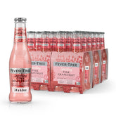 Fever-Tree Sparkling Pink Grapefruit bottle being poured for cocktails.