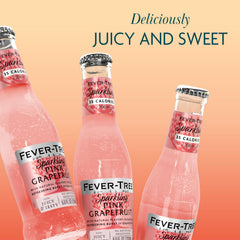 Bubbles rising in Fever-Tree Sparkling Pink Grapefruit in a glass.