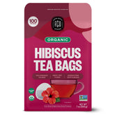 FGO organic hibiscus tea bag resting in kraft packaging for caffeine-free refreshment