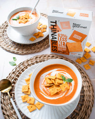 Fiber Gourmet Thinables Original closeup highlighting cheddar flavor and crisp texture