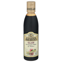 Filippo Berio glaze with balsamic Modena bottle pour for precise, tangy protein glaze