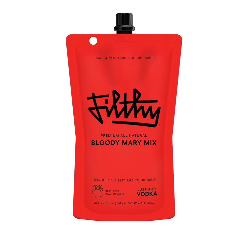 Filthy Food Bloody Mary Mix pouch on a bar counter, ready for restaurant-quality cocktails at home.