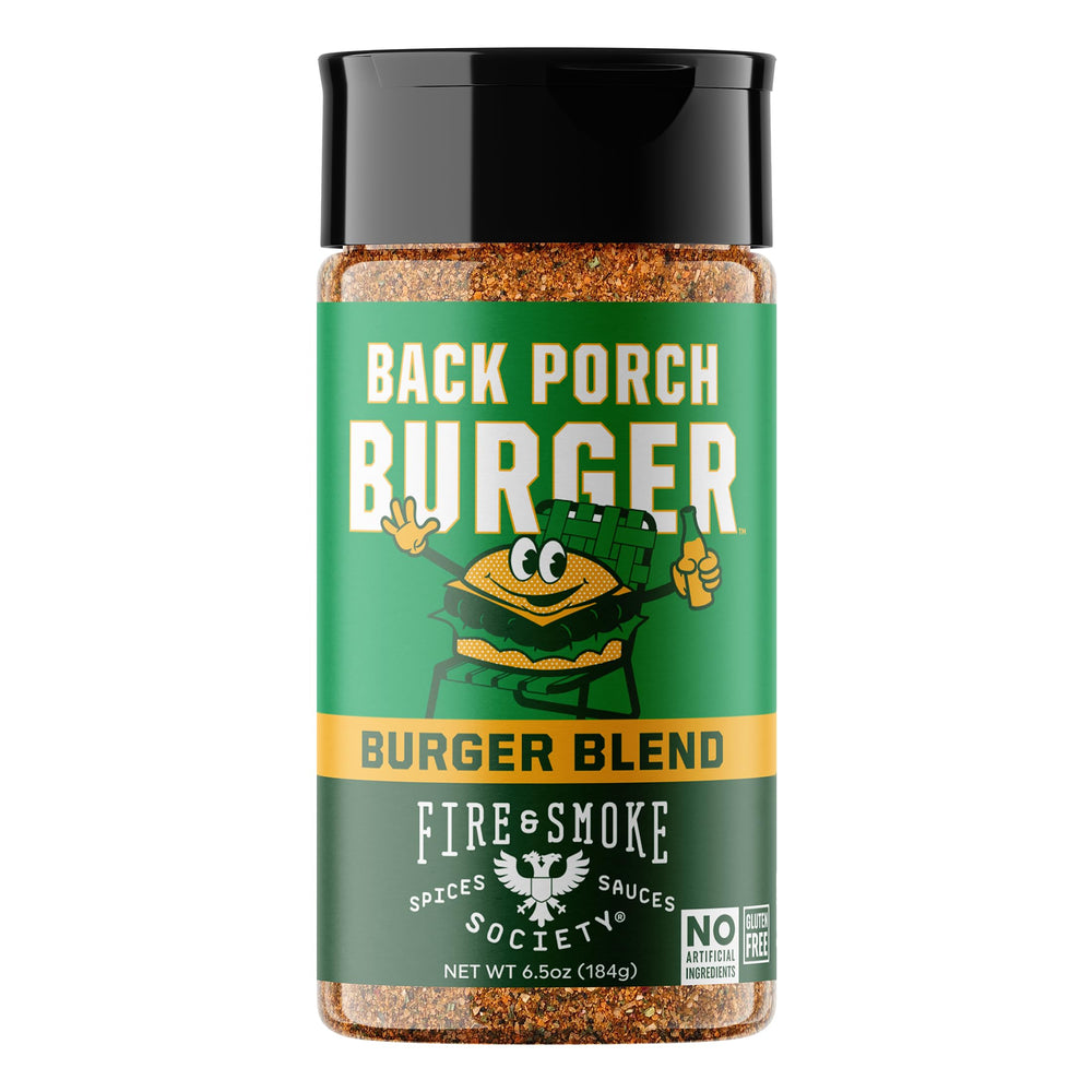 Fire & Smoke Society Back Porch Burger bottle on grill enhancing beef flavor.