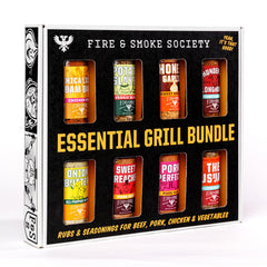 Fire & Smoke Society variety pack bottle pour for even grilling seasoning.