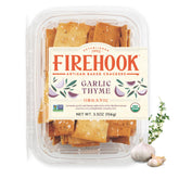 Firehook Garlic Thyme Crackers on a cheese board, ideal with pecorino romano.