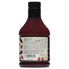 Fischer & Wieser Roasted Raspberry Chipotle sauce brushed onto meat, smoky-sweet glaze ready.