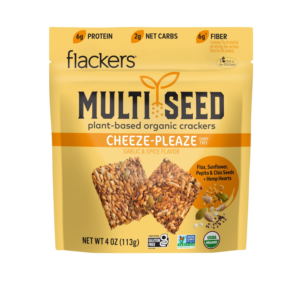 Flackers Cheeze-Pleaze crackers pack on counter showing organic multi-seed texture, ideal for keto snacking.
