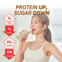 Flimeal Brown 17Grains protein shake being poured into a glass.