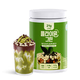 FLIMEAL GreenTea Matcha Protein Shake with crunchy balls in glass for post-workout satiety.