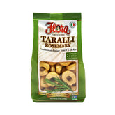 Flora Taralli Rosemary packaging on a rustic board, ideal for entertaining guests.