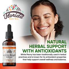 Close-up of Florida Herbs White Peony tincture dropper releasing precise servings.
