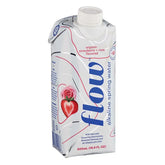 Flow Water alkaline strawberry-rose bottle pouring for refreshing hydration.