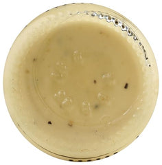 Salad bowl featuring Fody Caesar dressing as a flavorful topping.