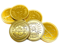 Foiled Again! St. Patrick's Day coins on a party table for decor