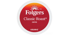 Folgers Classic Roast K-Cup steaming mug for a rich morning ritual.