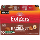 Folgers Toasty Hazelnut K-Cup pod close-up showing rich aroma for mornings.