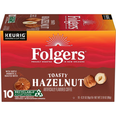 Folgers Toasty Hazelnut K-Cup pod close-up showing rich aroma for mornings.