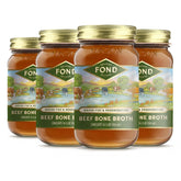 FOND Nourish Delight beef bone broth bottle pour showing convenient, sip-ready broth.