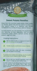 Four Elephants Sweet Potato Noodles in a pan-stir fry showcasing chewy texture and sauce absorption.