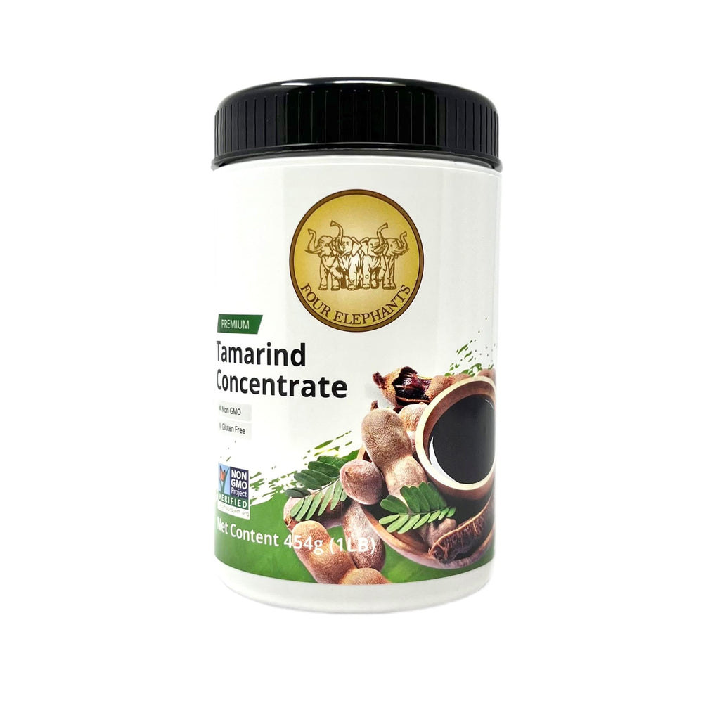 Four Elephants Tamarind Concentrate bottle for versatile sauces and marinades.