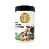 Four Elephants Tamarind Concentrate bottle for versatile sauces and marinades.