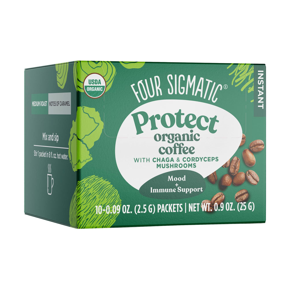 Four Sigmatic Organic Instant Coffee cup steaming with Cordyceps for focused mornings.