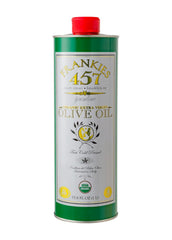 Frankies 457 Organic Olive Oil bottle pouring to finish dishes with rich flavor.