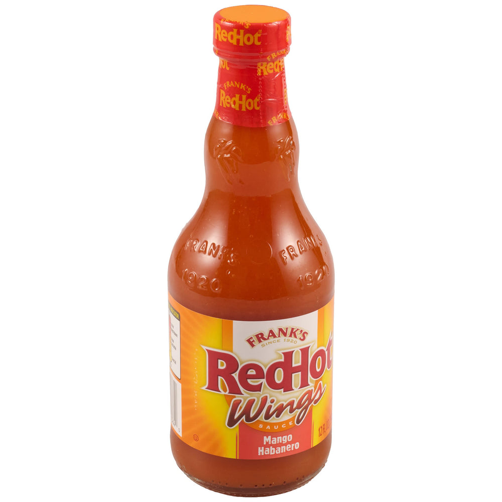 Frank's RedHot Mango Habanero bottle pouring to elevate wings with fruity heat.