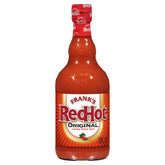 Frank's RedHot Original bottle being poured to add heat and flavor to wings