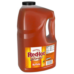 Frank's RedHot Original Buffalo Wings Sauce bottle pour highlights bold heat and buttery flavor