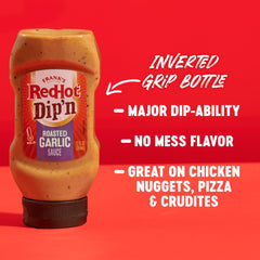 Onion rings dipped in Frank's Roasted Garlic Sauce for crisp heat.