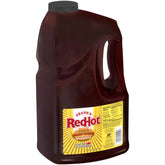 Frank's RedHot Stingin' Honey Garlic Sauce bottle pour for ready-to-use flavor boost.