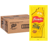 French's Classic Yellow Mustard packets on a serving tray, ideal for quick meals.