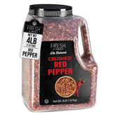 Fresh Finest crushed red pepper flakes jar pour enhances pizzas with bold heat.