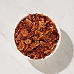 Fresh Gourmet Bacon-Less Bits on baked potatoes bring savory crunch.