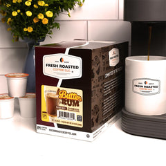 Fresh Roasted Coffee Butter Rum brew in a tall cup revealing warmth