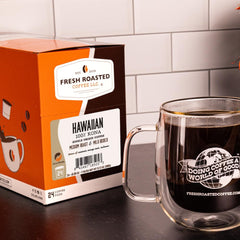 Fresh Roasted Coffee Kona K-Cup pods in a row for quick single-serve caffeine.