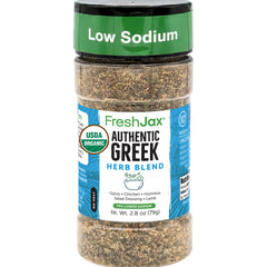 FreshJax Greek seasoning bottle front enhances grilled chicken flavor with authentic Mediterranean herbs.