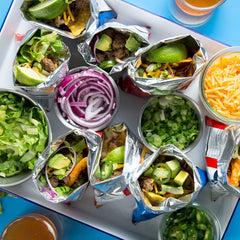 Snack pack on the go, showing portable Fritos chips and dip cups.
