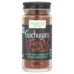 Frontier Co-op gochugaru chili jar closeup shows vibrant flakes for kimchi.