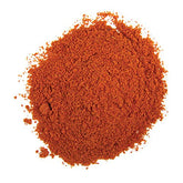 Frontier Co-op Organic Cayenne Chili Pepper Powder in a jar adds heat to soups and stews.