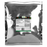 Frontier Co-op Pau d'Arco bark bulk bag displaying natural cut and sifted pieces for tea blends.