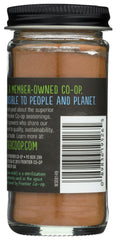 Frontier Co-op ground cinnamon jar label signals premium quality and ethical sourcing