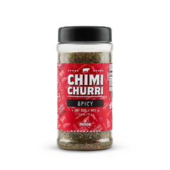 Frugoni Spicy Chimichurri bottle pouring onto grilled steak for bold flavor.