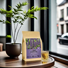 FullChea hyssop tea bags in cup captured for warm, caffeine-free relaxation.