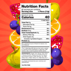 Vibrant color swirls on FUNTASTY lollipops displayed in a party setup.