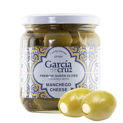 García DE LA cruz 1872 Manchego cheese stuffed olives in a jar, ideal for entertaining.