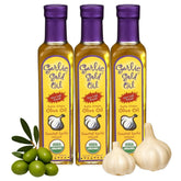 Garlic Gold infused olive oil bottle pouring, ideal for sautéing and finishing dishes.